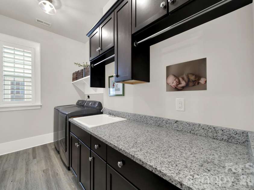 404 Sensibility Circle, Fort Mill, SC 29708.  MLS# CAR4387912, YatesRealty ID 33266. Laundry Room on Main Level