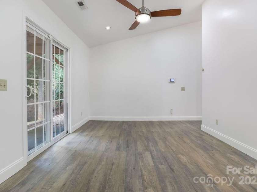 872 Hayes Road, Columbus, NC 28722.  MLS# CAR4291604, YatesRealty ID 33269. Dining space with back deck access