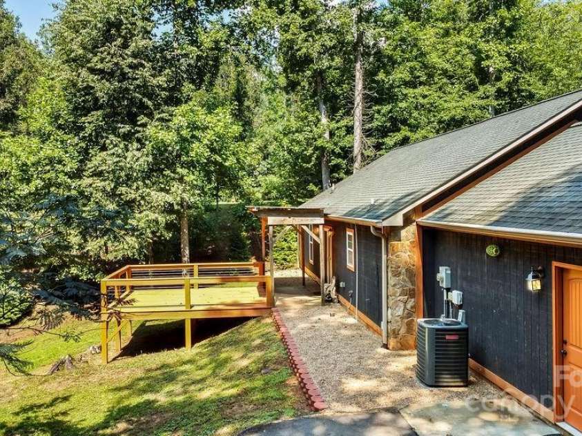 872 Hayes Road, Columbus, NC 28722.  MLS# CAR4291604, YatesRealty ID 33269. New and functional landscaping on the backside of the house