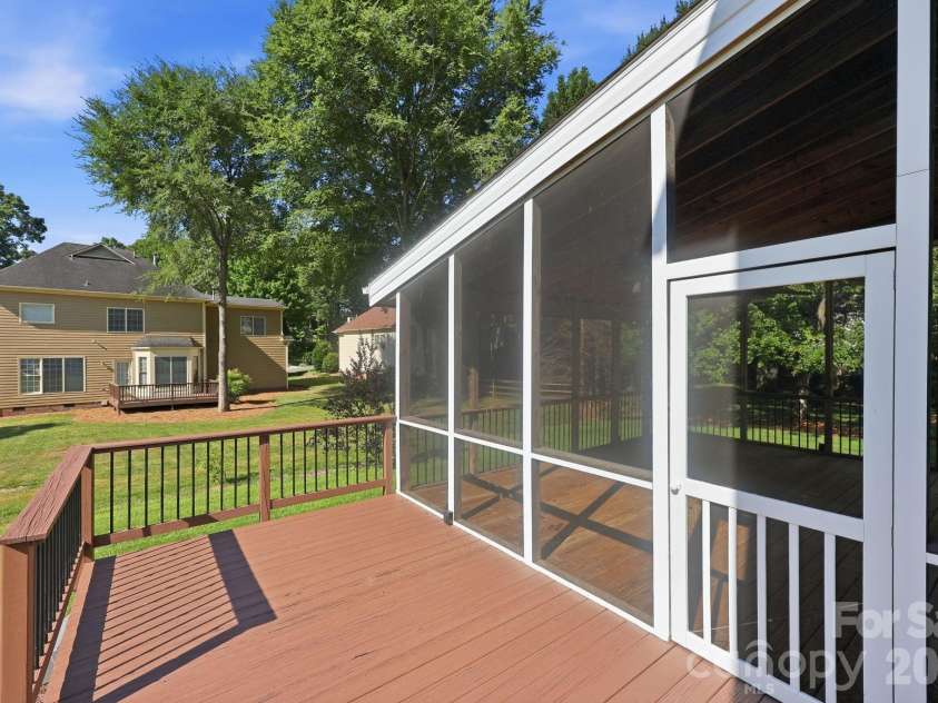 9004 Scottsboro Drive, Huntersville, NC 28078.  MLS# CAR4394126, YatesRealty ID 33272. Newly Stained Deck