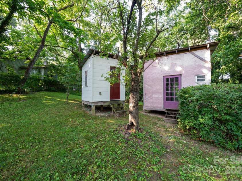 54 Downing Street, Asheville, NC 28806.  MLS# CAR4274017, YatesRealty ID 33273. 2 sheds for your creative side