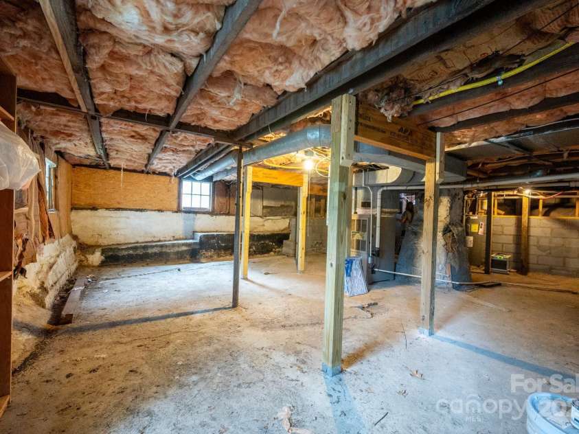 54 Downing Street, Asheville, NC 28806.  MLS# CAR4274017, YatesRealty ID 33273. Dry basement is ideal for storage