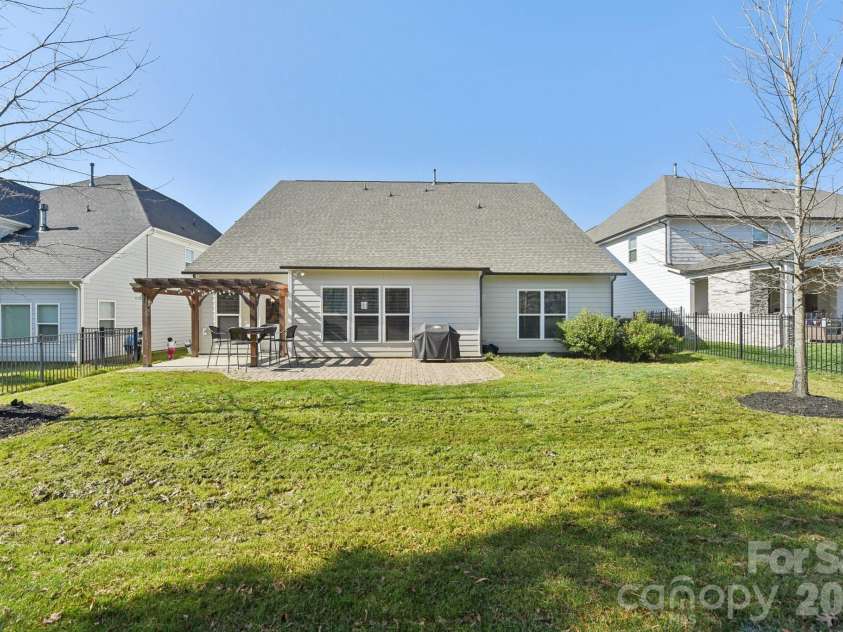 204 Hampton Trail Drive, Fort Mill, SC 29708.  MLS# CAR4350290, YatesRealty ID 33275. Backyard with pergola, perfect for entertaining.