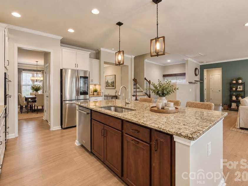 204 Hampton Trail Drive, Fort Mill, SC 29708.  MLS# CAR4350290, YatesRealty ID 33275. Staged chef's kitchen overlooking the great room.
