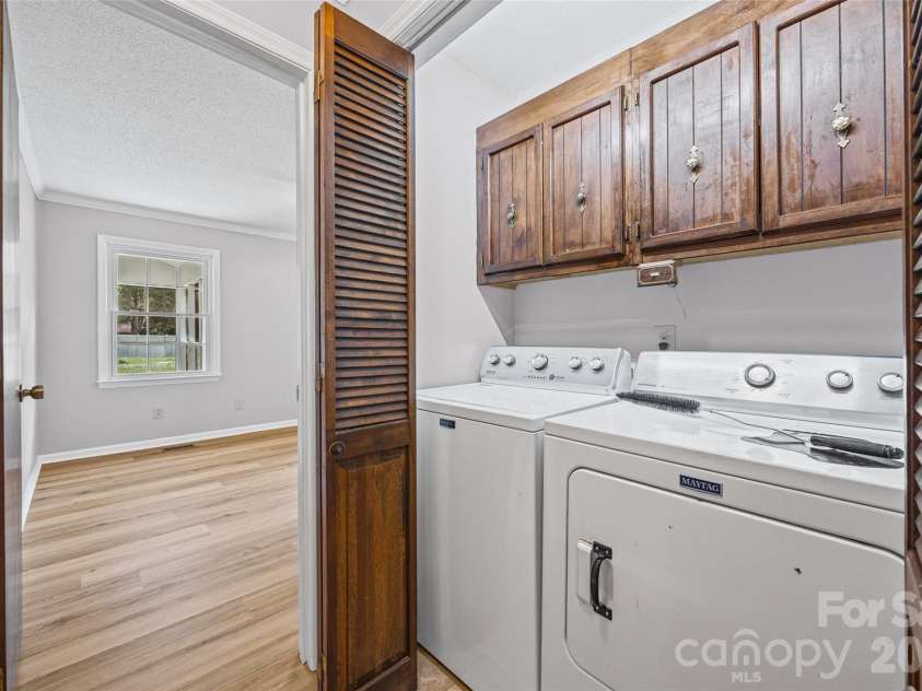 504 Carson Road, Gastonia, NC 28052.  MLS# CAR4377529, YatesRealty ID 33282. Laundry leading to Primary