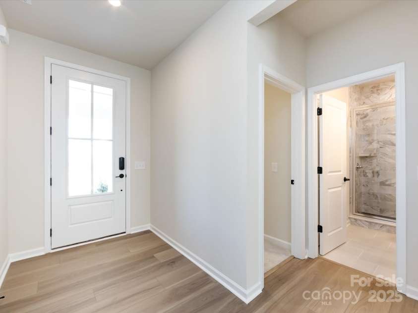 7023 Short Stirrup Lane, Mint Hill, NC 28227.  MLS# CAR4291701, YatesRealty ID 33286. Front entry foyer with 8' doorways to elevate the first impression.