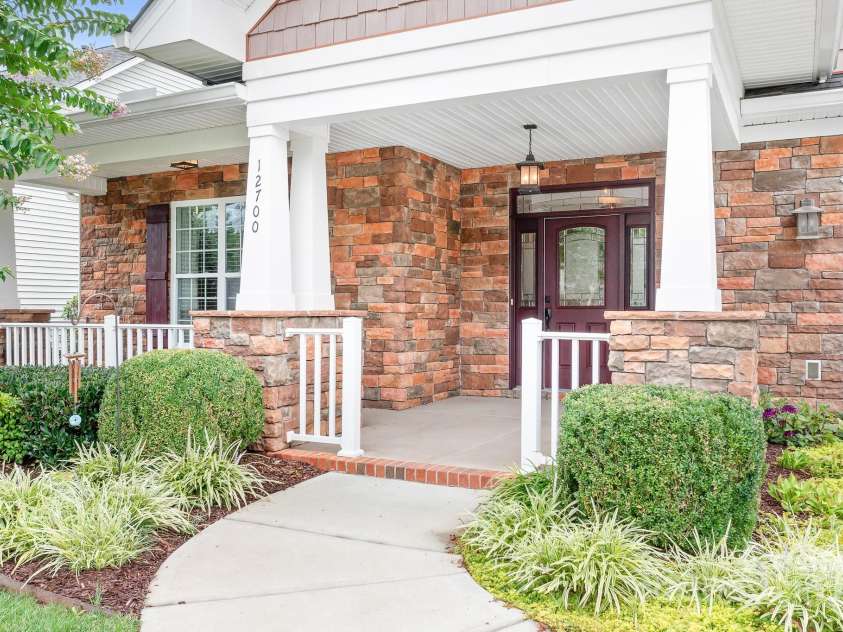 12700 Meetinghouse Drive, Cornelius, NC 28031.  MLS# CAR4287872, YatesRealty ID 33288. Stone entrance