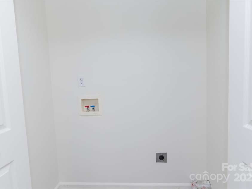 1083 Elljoy Lane, Salisbury, NC 28146.  MLS# CAR4263948, YatesRealty ID 33289. Laundry closet