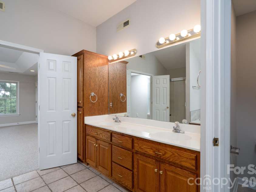 2116 Quail Drive, Concord, NC 28027.  MLS# CAR4389135, YatesRealty ID 33289. 