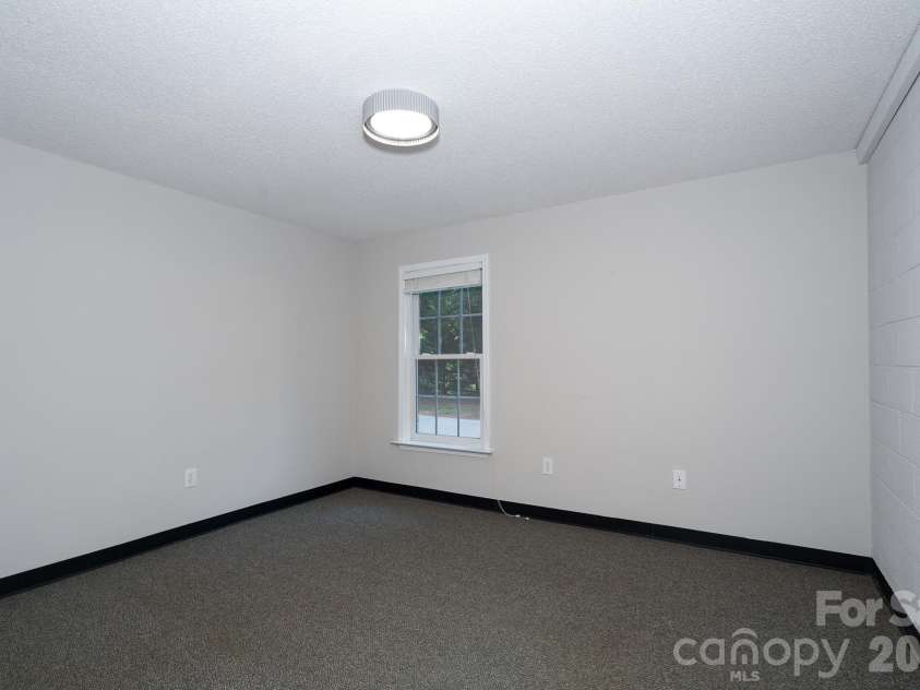 2116 Quail Drive, Concord, NC 28027.  MLS# CAR4389135, YatesRealty ID 33289. Extra room in basement.