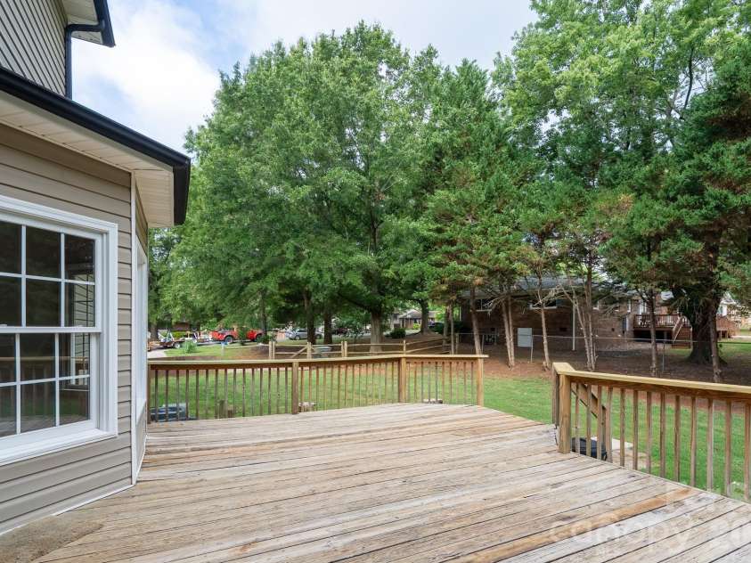 2116 Quail Drive, Concord, NC 28027.  MLS# CAR4389135, YatesRealty ID 33289. Huge deck.