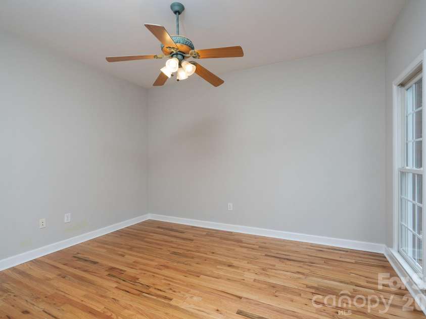 2116 Quail Drive, Concord, NC 28027.  MLS# CAR4389135, YatesRealty ID 33289. Office/ front room.