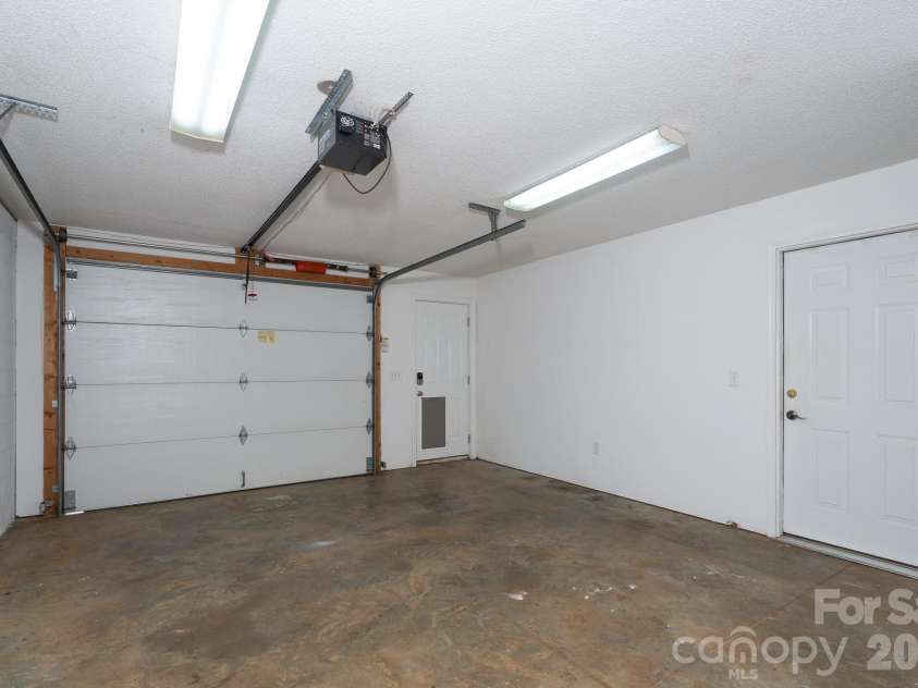 2116 Quail Drive, Concord, NC 28027.  MLS# CAR4389135, YatesRealty ID 33289. Side garage in basement.
