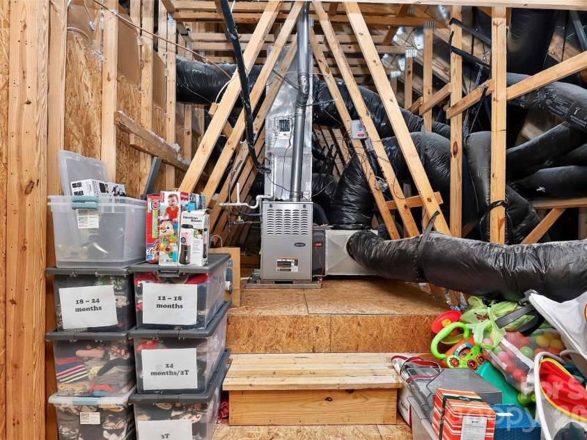 4540 Blackmuir Wood Circle, Charlotte, NC 28270.  MLS# CAR4388580, YatesRealty ID 33291. Walk-in Attic Storage