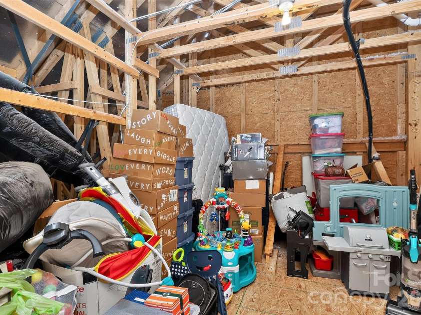 4540 Blackmuir Wood Circle, Charlotte, NC 28270.  MLS# CAR4388580, YatesRealty ID 33291. Walk-in Attic Storage