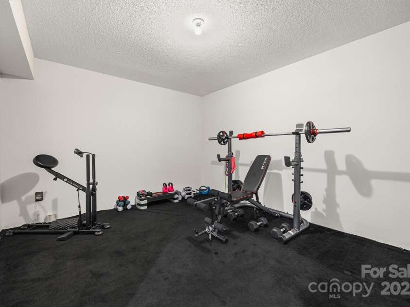 5709 Selkirkshire Road, Charlotte, NC 28278.  MLS# CAR4290990, YatesRealty ID 33291. Exercise Room in Basement