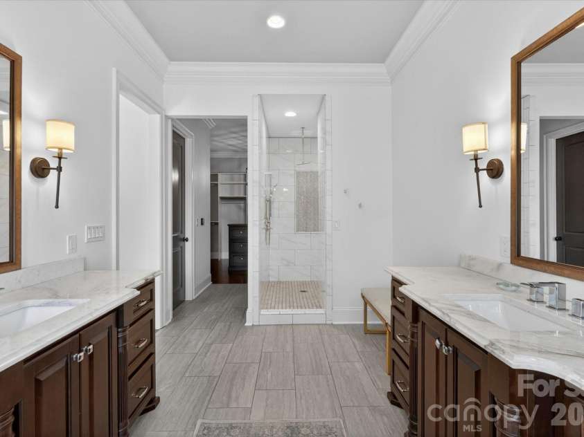 827 Misty Arbor Ford, Clover, SC 29710.  MLS# CAR4391650, YatesRealty ID 33297. Dual vanities and oversized shower.