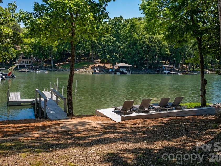 827 Misty Arbor Ford, Clover, SC 29710.  MLS# CAR4391650, YatesRealty ID 33297. Lakeside lounge deck with cove views.