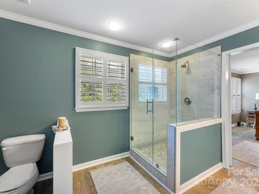 370 Battery Circle, Clover, SC 29710.  MLS# CAR4309546, YatesRealty ID 333. Updated primary bath with gorgeous custom walk-in tiled shower.
