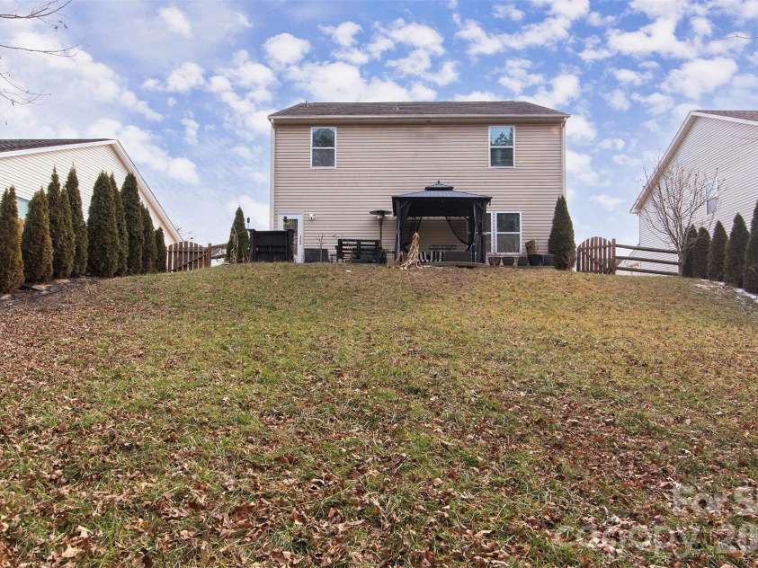 12848 Clydesdale Drive, Midland, NC 28107.  MLS# CAR4340099, YatesRealty ID 3330. Backyard view of property