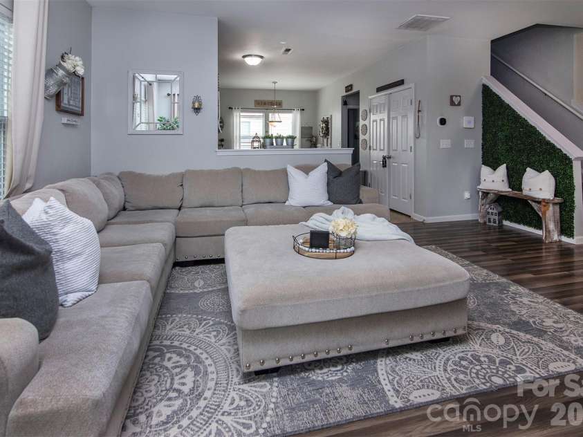 12848 Clydesdale Drive, Midland, NC 28107.  MLS# CAR4340099, YatesRealty ID 3330. Great room with view of kitchen and stairs 