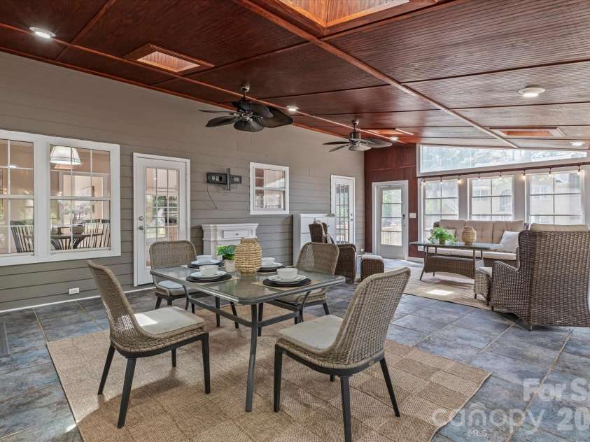 122 Lake Pine Road, Mooresville, NC 28117.  MLS# CAR4397434, YatesRealty ID 33309. Sunroom has skylights for extra light