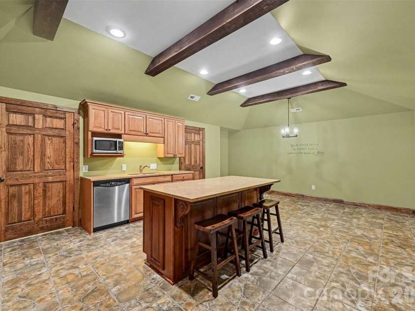 2110 Highland Forest Drive, Marvin, NC 28173.  MLS# CAR4390983, YatesRealty ID 33310. Basement kitchen