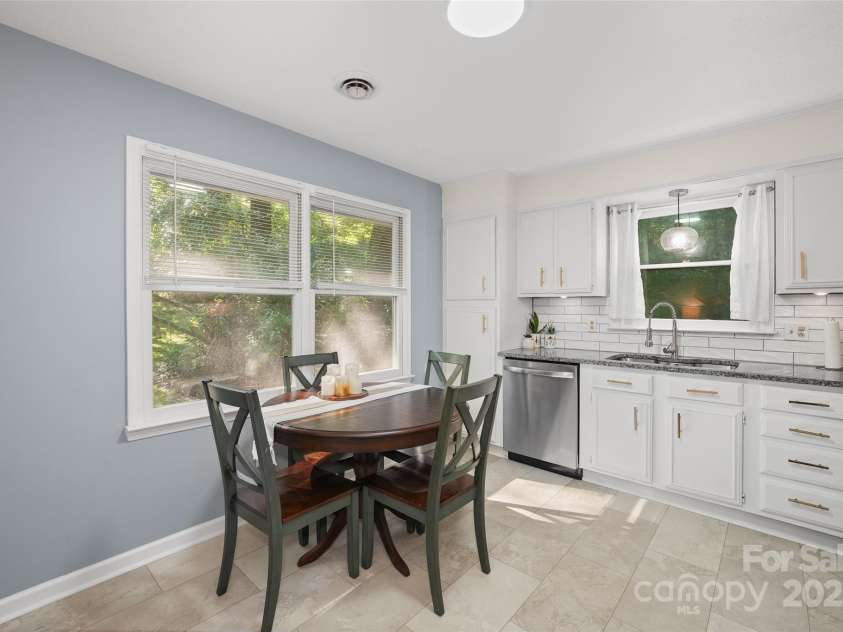 155 Timberlane Drive, Etowah, NC 28729.  MLS# CAR4290050, YatesRealty ID 33313. Dining area