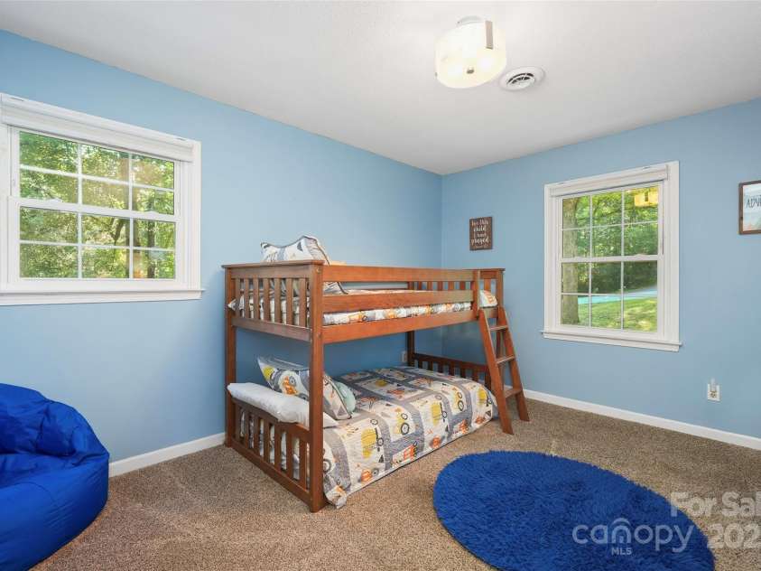155 Timberlane Drive, Etowah, NC 28729.  MLS# CAR4290050, YatesRealty ID 33313. Second bedroom with lots of natural light