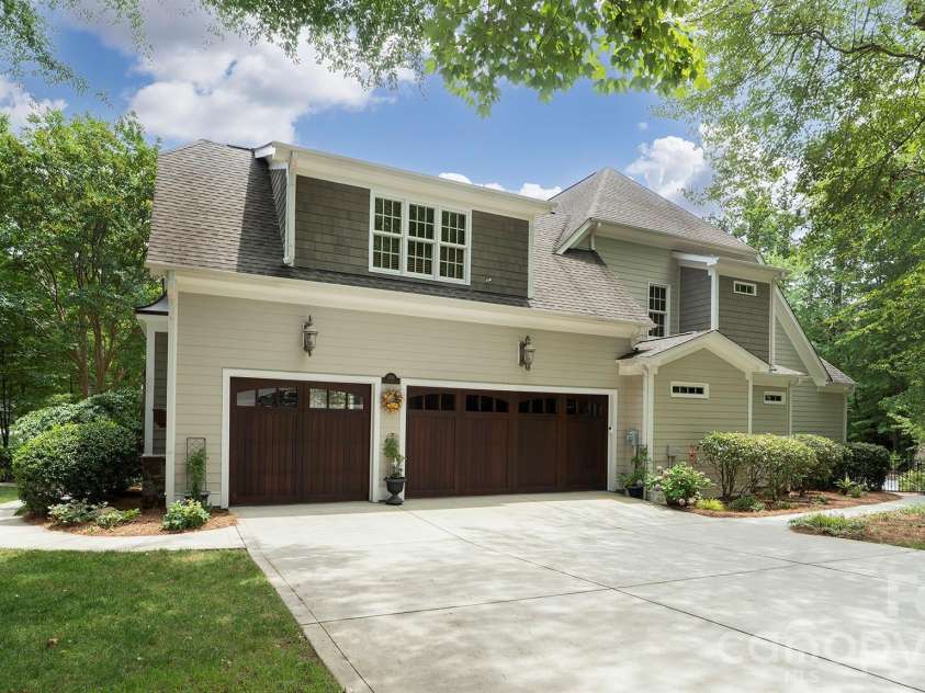 4293 Soaring Eagle Cove Court, Denver, NC 28037.  MLS# CAR4395644, YatesRealty ID 33313. 3 car garage with solid wood doors...