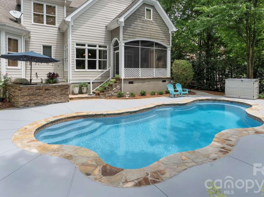 4293 Soaring Eagle Cove Court, Denver, NC 28037.  MLS# CAR4395644, YatesRealty ID 33313. Beautiful yard with pool...