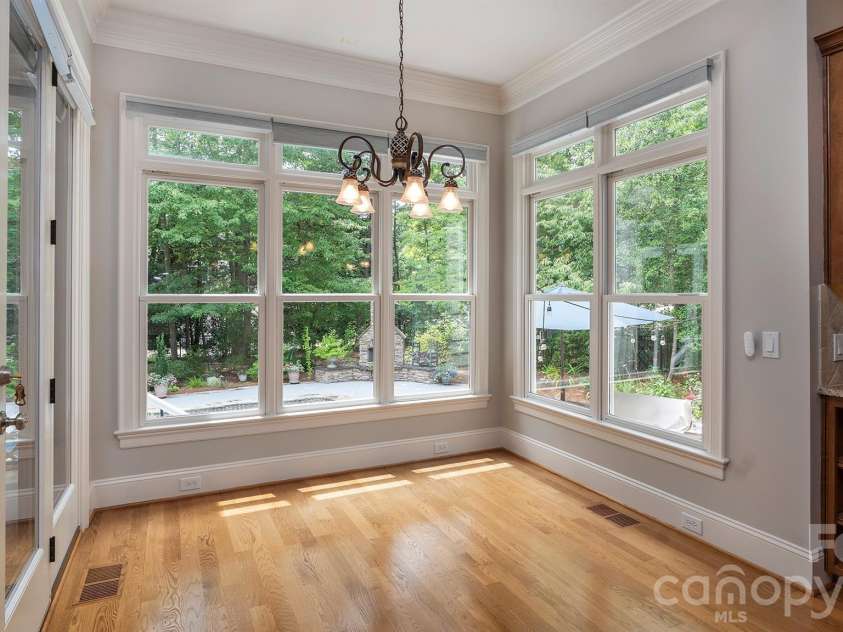 4293 Soaring Eagle Cove Court, Denver, NC 28037.  MLS# CAR4395644, YatesRealty ID 33313. Bright eating area overlooking beautiful yard...