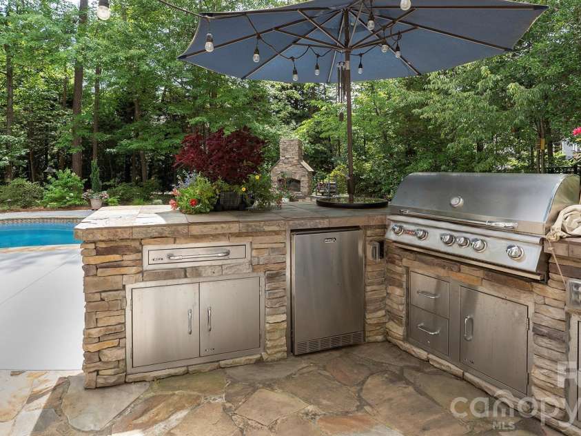 4293 Soaring Eagle Cove Court, Denver, NC 28037.  MLS# CAR4395644, YatesRealty ID 33313. Outdoor kitchen...