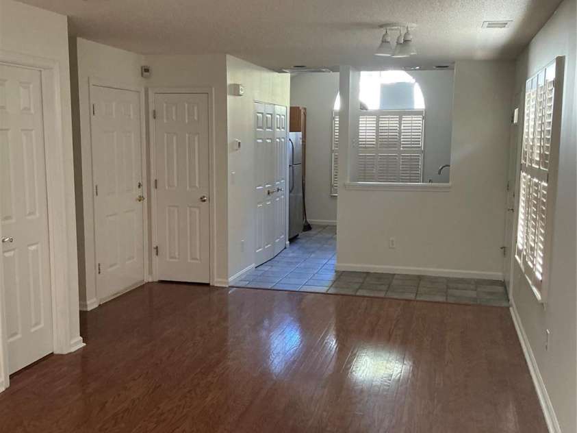 5884 Prescott Court, Charlotte, NC 28269.  MLS# CAR4263985, YatesRealty ID 33317. View to kitchen from livingroom