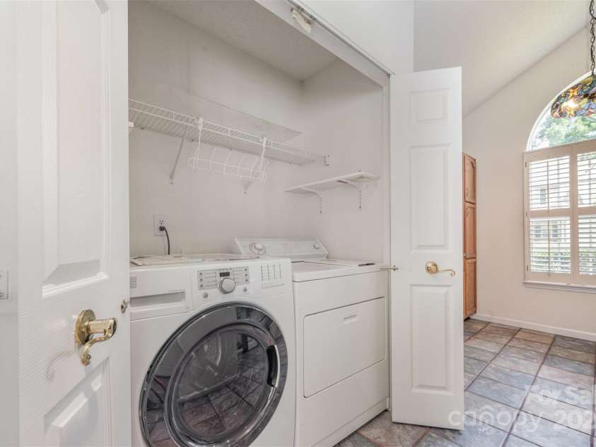 5884 Prescott Court, Charlotte, NC 28269.  MLS# CAR4263985, YatesRealty ID 33317. Wash and dryer closet
