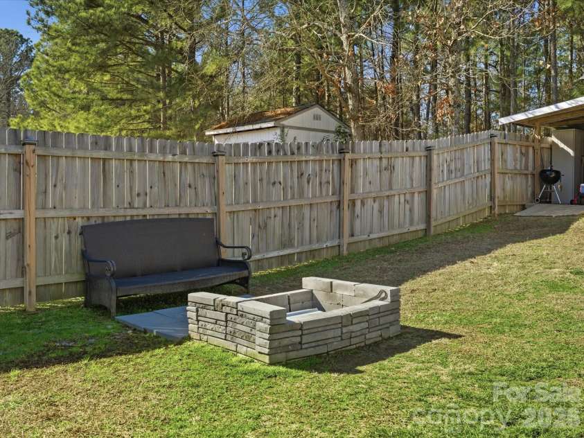 1280 Shenandoah Circle, Rock Hill, SC 29730.  MLS# CAR4336060, YatesRealty ID 3332. Enjoy sitting by the fire 