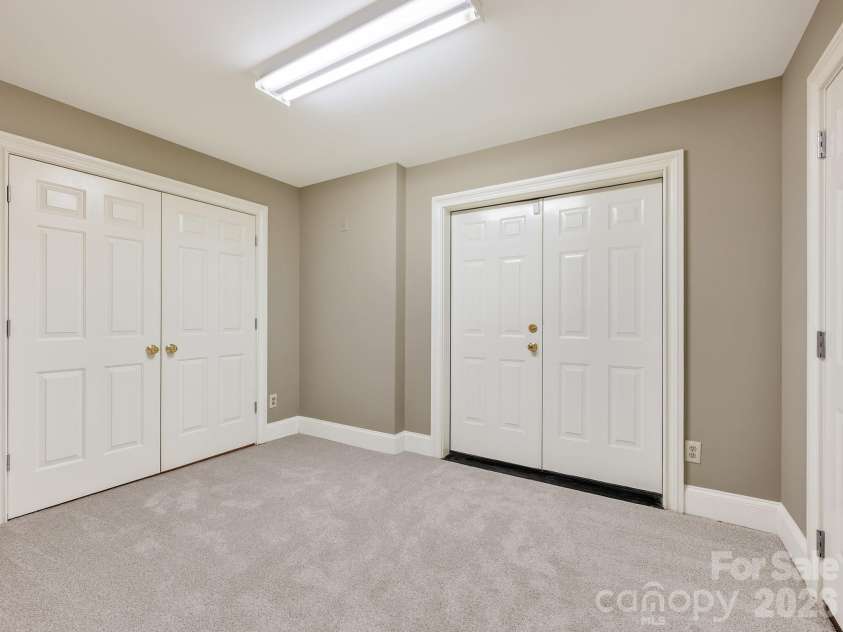 14483 Nolen Lane, Charlotte, NC 28277.  MLS# CAR4364895, YatesRealty ID 33320. Lower level flex space with access to lower level 2 car garage