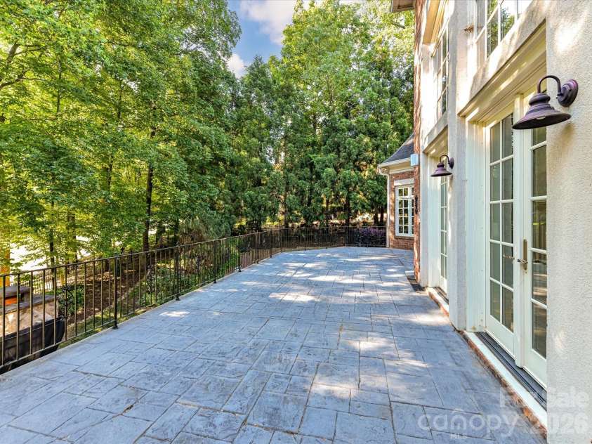 14483 Nolen Lane, Charlotte, NC 28277.  MLS# CAR4364895, YatesRealty ID 33320. Upper terrace overlooking lower patio and golf course