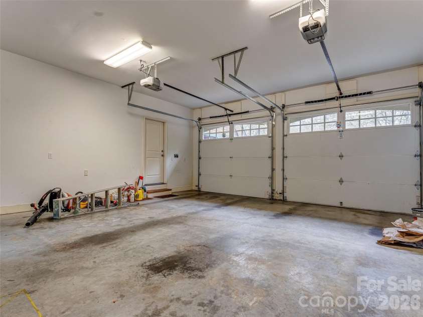 5 Stegall Lane, Asheville, NC 28805.  MLS# CAR4368242, YatesRealty ID 33322. Two-car attached garage.