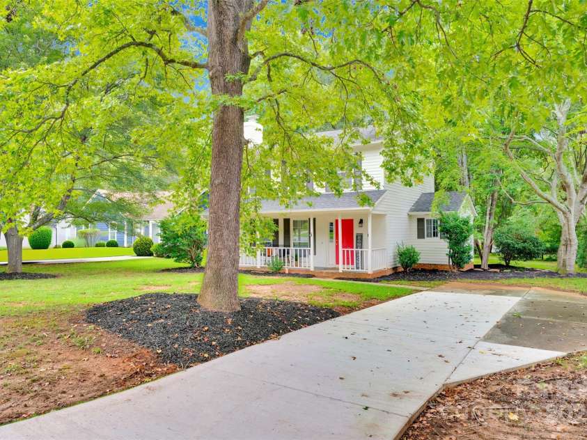 6648 Pinta Court, Charlotte, NC 28227.  MLS# CAR4293720, YatesRealty ID 33329. Extra Long Driveway - New Concrete!
