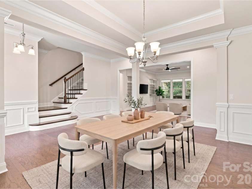 5701 Regal Way, Indian Land, SC 29707.  MLS# CAR4382841, YatesRealty ID 33330. Virtually staged dining room with wide foyer behind it.