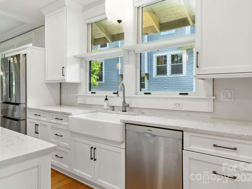 38 Austin Avenue, Asheville, NC 28801.  MLS# CAR4293035, YatesRealty ID 33331. Farmhouse sink and high end appliances