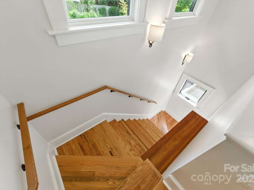 38 Austin Avenue, Asheville, NC 28801.  MLS# CAR4293035, YatesRealty ID 33331. Stairway to back deck and basement