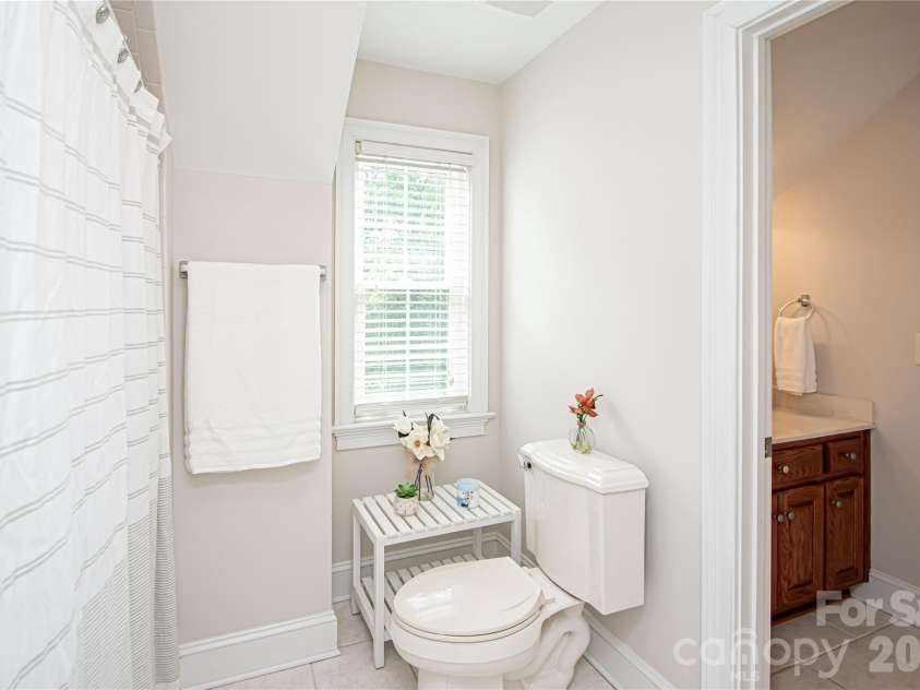 1015 Estate Lane, Matthews, NC 28104.  MLS# CAR4388127, YatesRealty ID 33333. Jack and Jill Bathroom has 2 separate rooms for vanities.