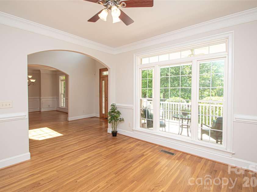 1015 Estate Lane, Matthews, NC 28104.  MLS# CAR4388127, YatesRealty ID 33333. Office has large windows that provide natural light.