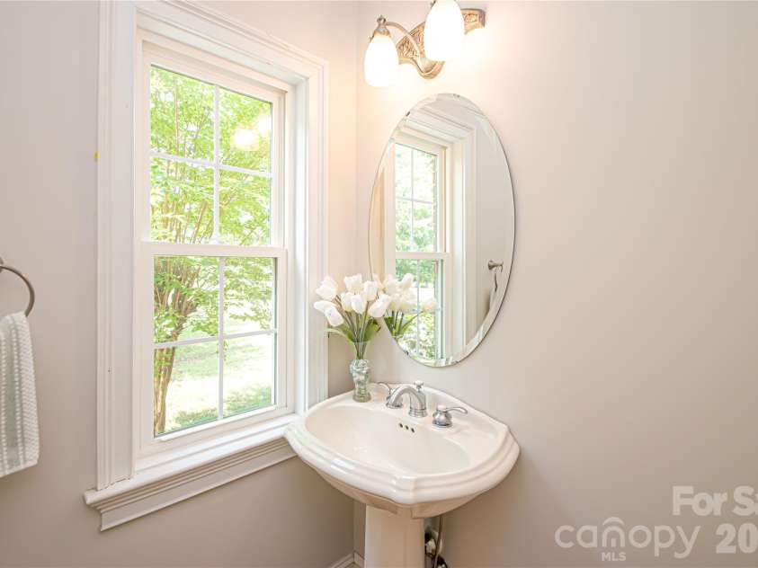 1015 Estate Lane, Matthews, NC 28104.  MLS# CAR4388127, YatesRealty ID 33333. Powder room