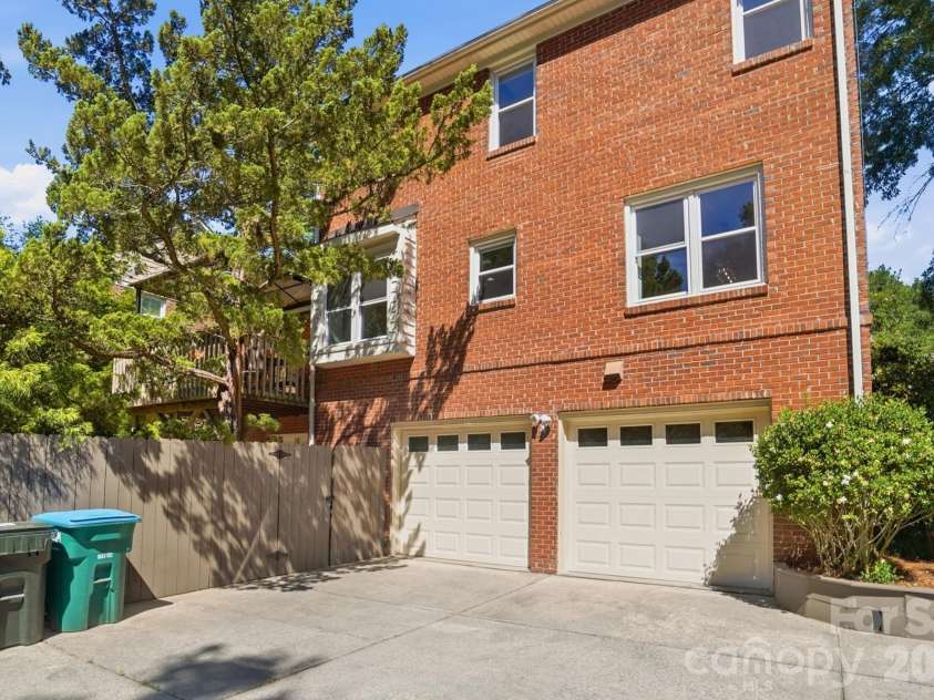 723 Walnut Point Drive, Matthews, NC 28105.  MLS# CAR4391716, YatesRealty ID 33345. Back Exterior/Garage Entry