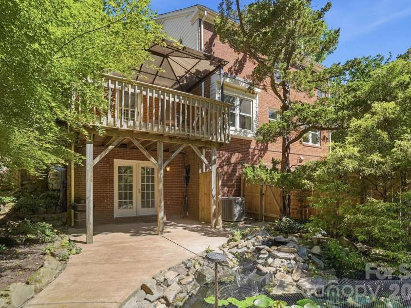 723 Walnut Point Drive, Matthews, NC 28105.  MLS# CAR4391716, YatesRealty ID 33345. Covered Patio Next to Pond