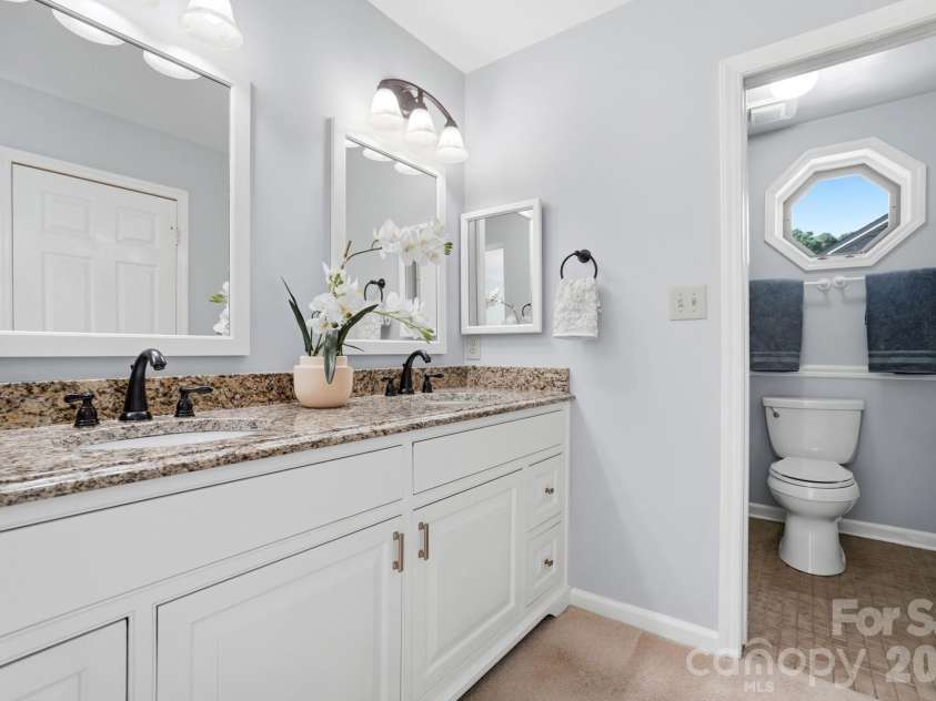 723 Walnut Point Drive, Matthews, NC 28105.  MLS# CAR4391716, YatesRealty ID 33345. Double Sink Vanity in Primary Bathroom