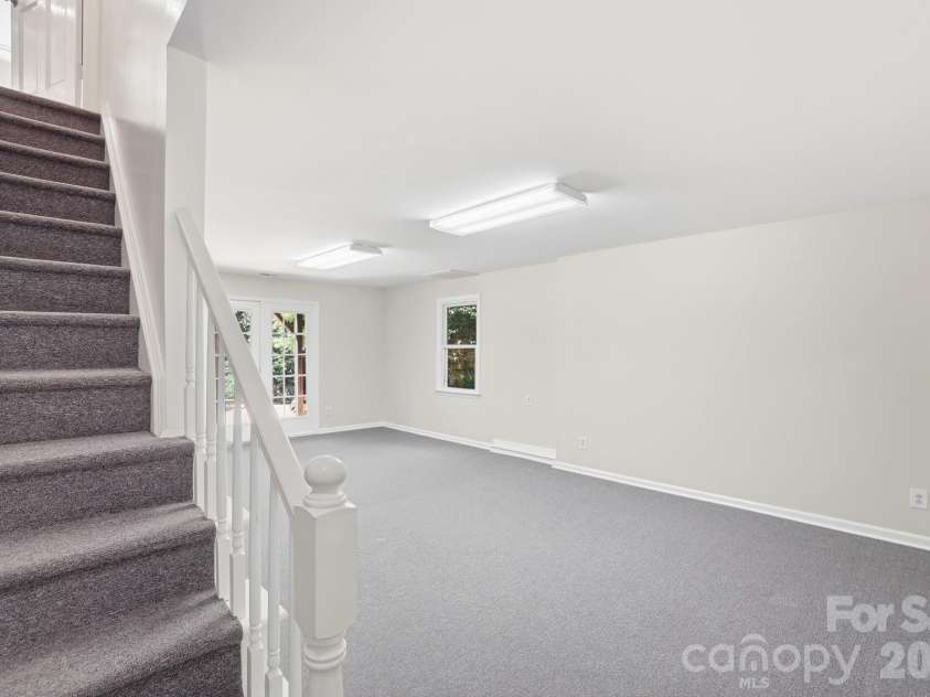 723 Walnut Point Drive, Matthews, NC 28105.  MLS# CAR4391716, YatesRealty ID 33345. Finished Basement Bonus Room/Flex Space